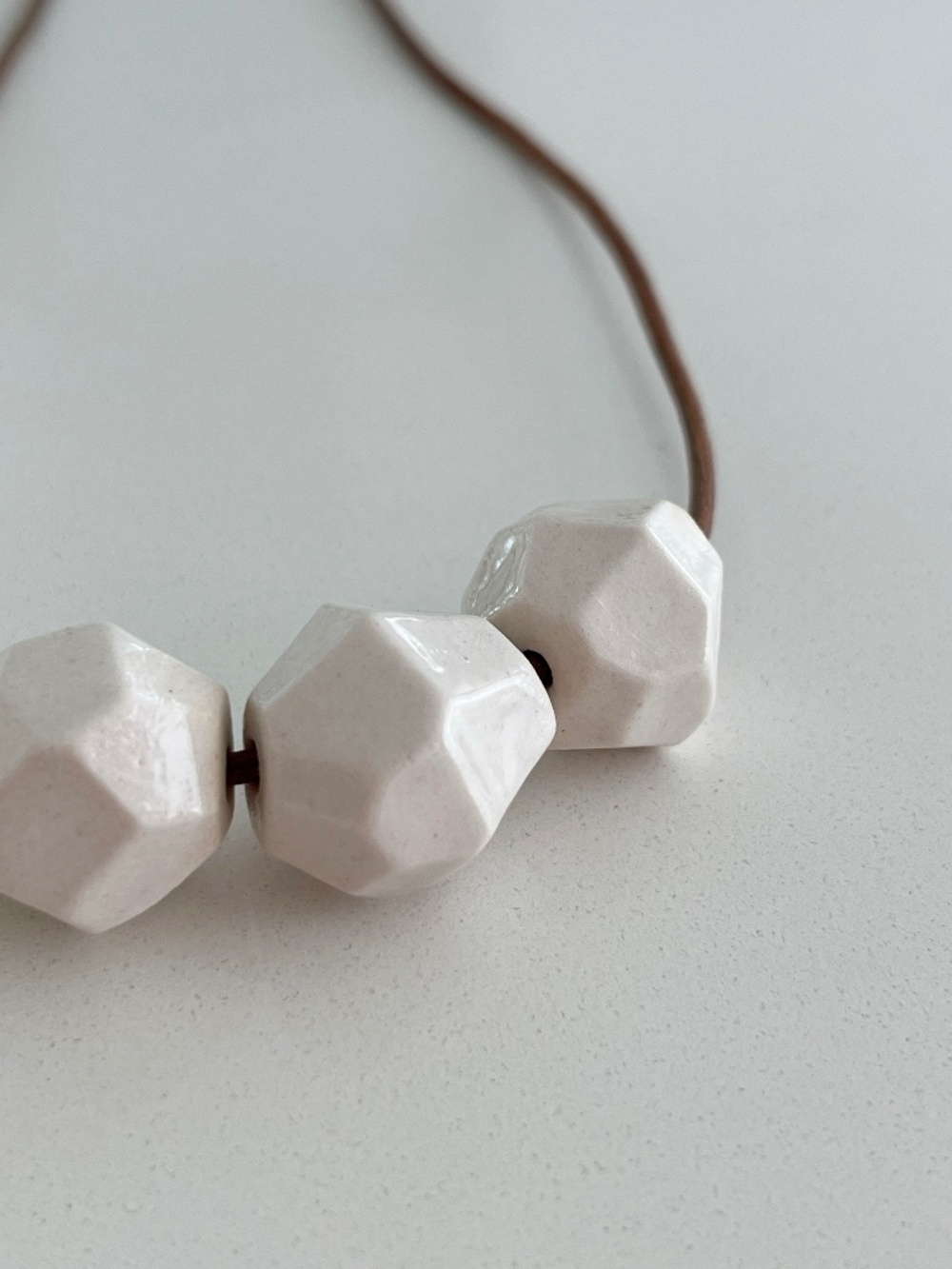 Minimalist Faceted Ceramic Bead Cord Necklace White Geometric